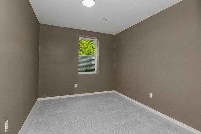 7658 Silver Lake Rd, Mounds View, MN 55112 - spare room with carpet flooring and baseboards