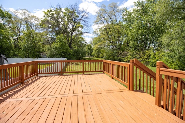 7658 Silver Lake Rd, Mounds View, MN 55112 - wooden terrace with view of scattered trees