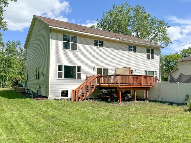7658 Silver Lake Rd, Mounds View, MN 55112 - rear view of property with a wooden deck, central AC, and stairs