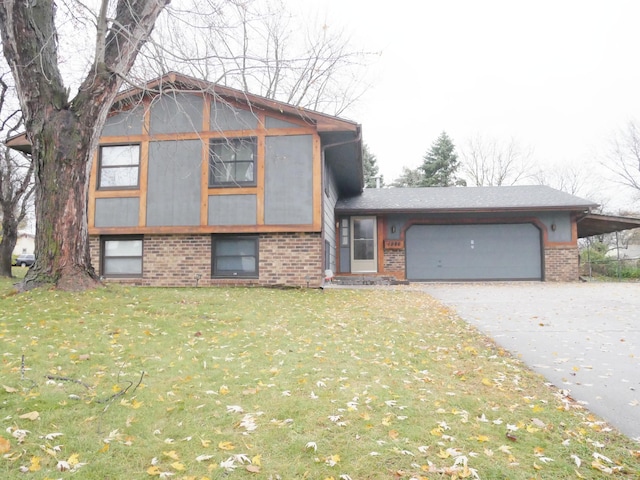 1996 Kingston Ave E, Maplewood, MN 55109 - split level home with brick siding, concrete driveway, a garage, and a front yard