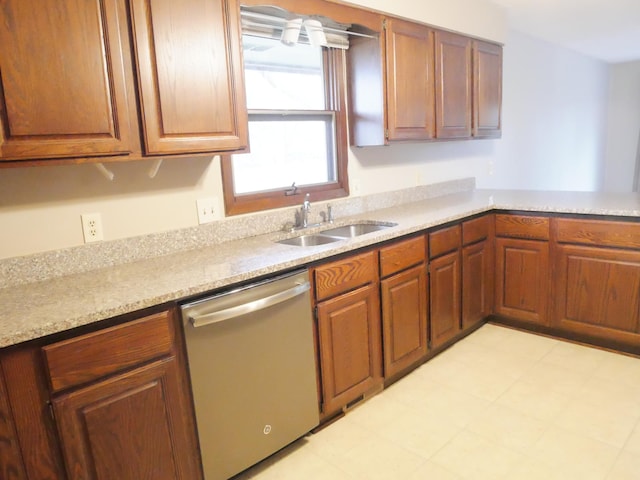 1996 Kingston Ave E, Maplewood, MN 55109 - kitchen with dishwasher, a sink, light countertops, and brown cabinets