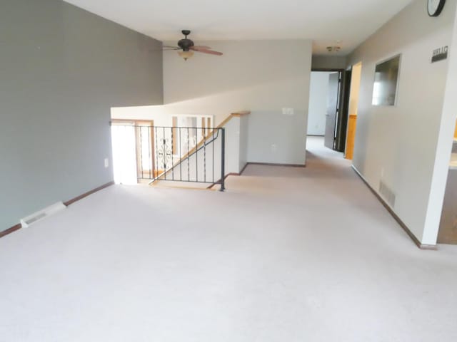 1996 Kingston Ave E, Maplewood, MN 55109 - carpeted empty room with ceiling fan and baseboards