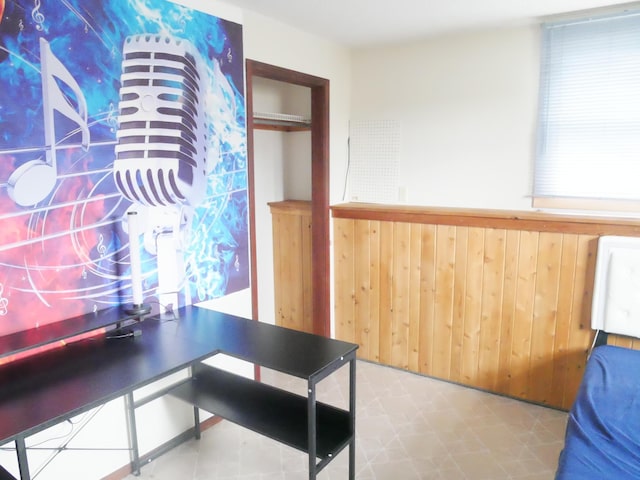 1996 Kingston Ave E, Maplewood, MN 55109 - home office with wood walls, tile patterned floors, and a wainscoted wall
