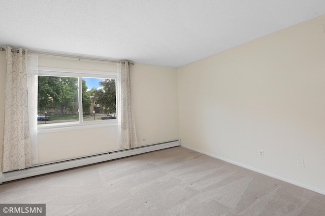 2800 Hillsboro Ave N Unit 108, New Hope, MN 55427 - carpeted empty room featuring baseboard heating and baseboards
