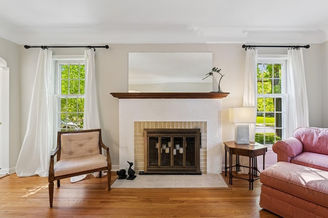 5604 14th Ave S, Minneapolis, MN 55417 - living area with plenty of natural light, wood finished floors, and a fireplace