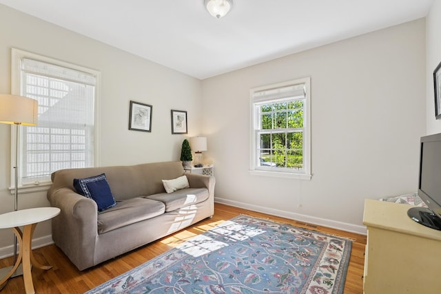 5604 14th Ave S, Minneapolis, MN 55417 - living area with baseboards and wood finished floors