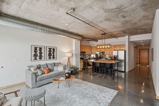 720 4th St Unit 603, Minneapolis, MN 55401 - living area with finished concrete flooring and baseboards