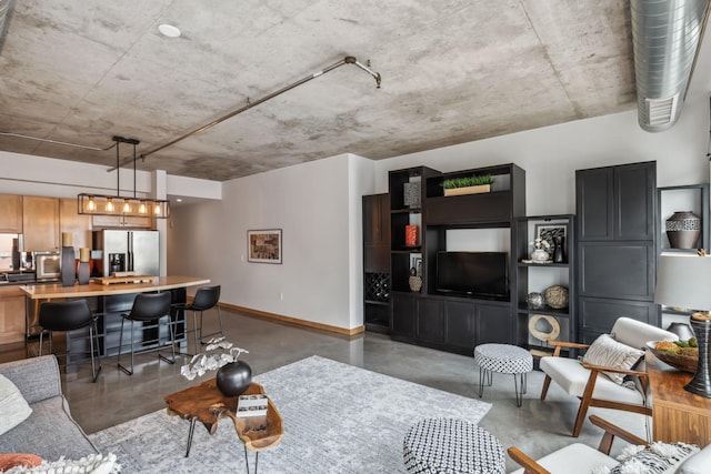 720 4th St Unit 603, Minneapolis, MN 55401 - living room with concrete flooring and baseboards