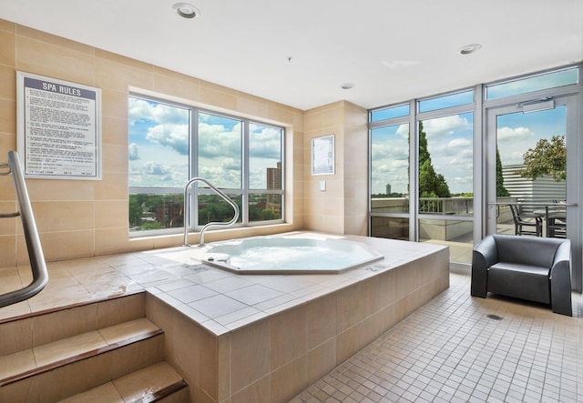 929 Portland Ave Unit 907, Minneapolis, MN 55404 - bathroom with tiled tub, recessed lighting, and tile patterned floors