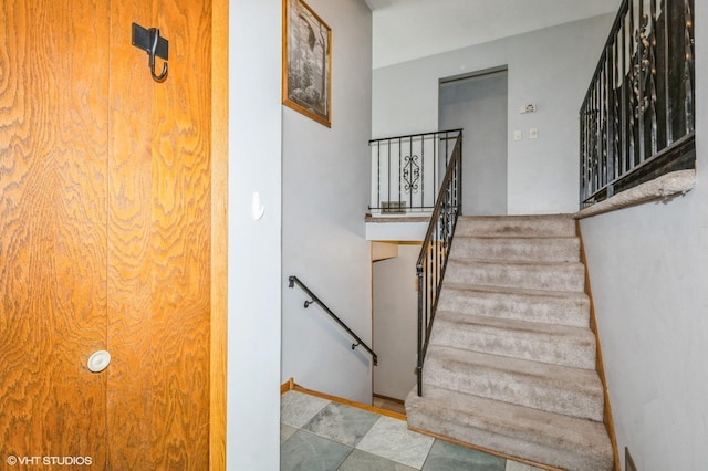 17551 London St NE, Ham Lake, MN 55304 - stairway featuring baseboards