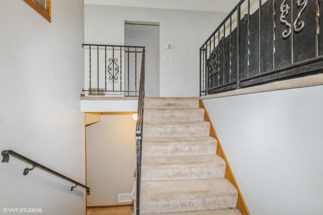 17551 London St NE, Ham Lake, MN 55304 - staircase with carpet flooring and baseboards