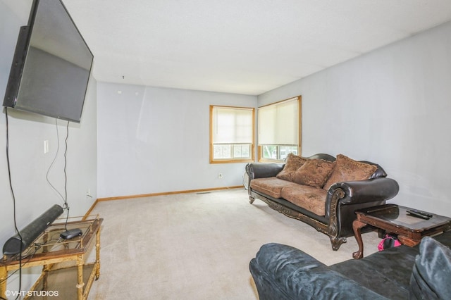 17551 London St NE, Ham Lake, MN 55304 - living room featuring carpet flooring and baseboards