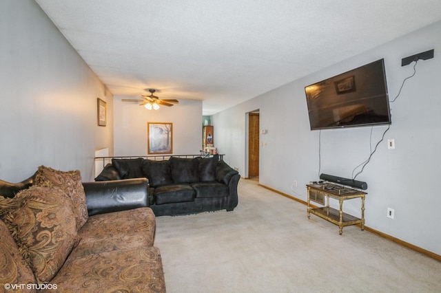 17551 London St NE, Ham Lake, MN 55304 - living room featuring carpet, ceiling fan, and baseboards