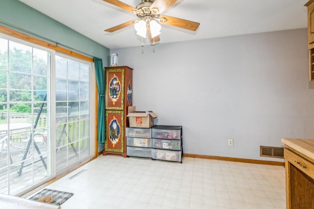 17551 London St NE, Ham Lake, MN 55304 - unfurnished room with ceiling fan and baseboards