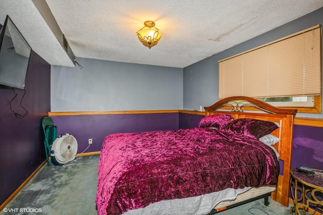 17551 London St NE, Ham Lake, MN 55304 - carpeted bedroom with a textured ceiling and baseboards