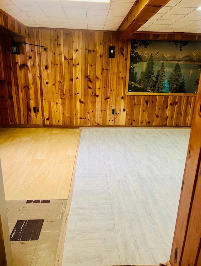 150 Park St W, South Saint Paul, MN 55075 - spare room with wood finished floors and wooden walls
