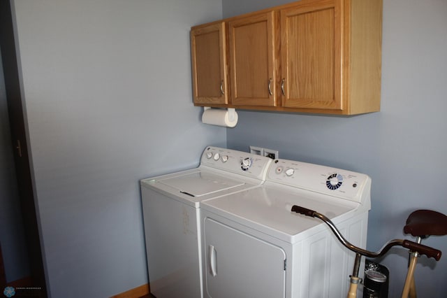 3441 25th St S, Moorhead, MN 56560 - washroom featuring cabinet space and washer and clothes dryer