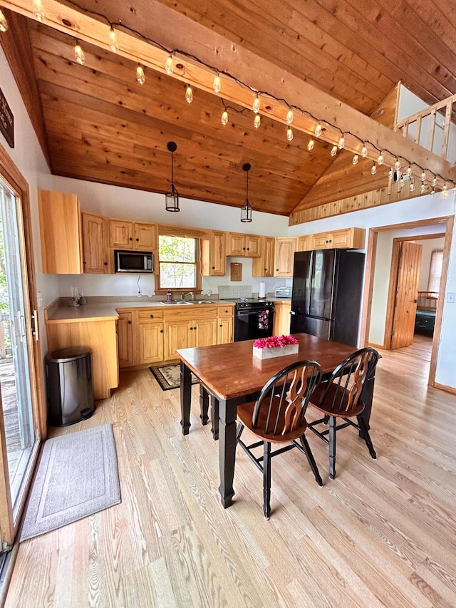 2145 Big Deep Lake Dr NW, Hackensack, MN 56452 - kitchen with black appliances, light brown cabinetry, vaulted ceiling, light wood-type flooring, and wood ceiling