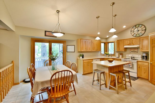 1518 4th Ave N, Sartell, MN 56377 - kitchen with white electric range oven, light brown cabinets, light countertops, a center island, and a sink