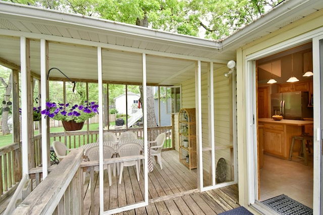 1518 4th Ave N, Sartell, MN 56377 - wooden deck with outdoor dining space