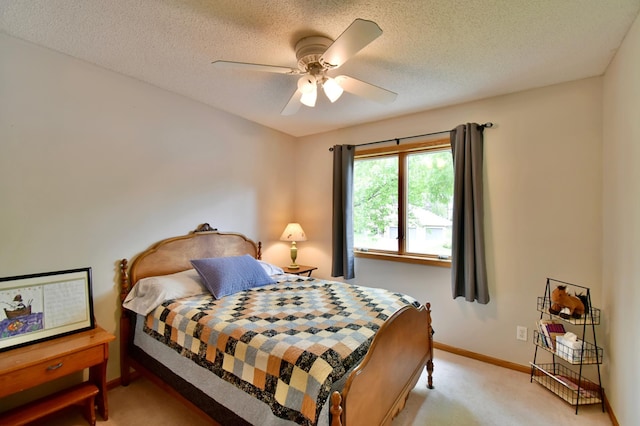 1518 4th Ave N, Sartell, MN 56377 - bedroom featuring light carpet, baseboards, a textured ceiling, and a ceiling fan