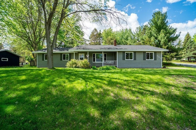 903 Ingalls Rd, Menomonie, WI 54751 - single story home with a porch, a front yard, and a chimney