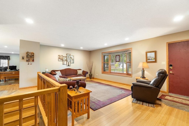 903 Ingalls Rd, Menomonie, WI 54751 - living area with recessed lighting, light wood finished floors, and baseboards