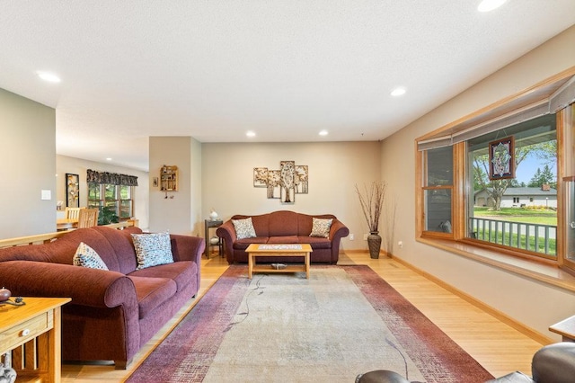 903 Ingalls Rd, Menomonie, WI 54751 - living room featuring wood finished floors, recessed lighting, and baseboards