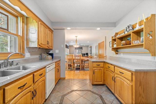 903 Ingalls Rd, Menomonie, WI 54751 - kitchen featuring white dishwasher, a sink, inlaid floor details, open shelves, and recessed lighting