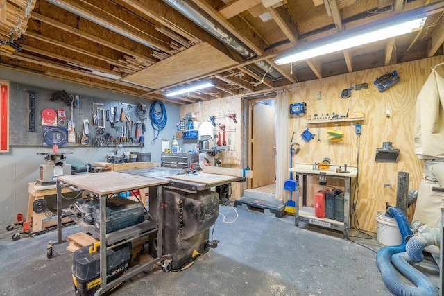 903 Ingalls Rd, Menomonie, WI 54751 - unfinished basement with a workshop area