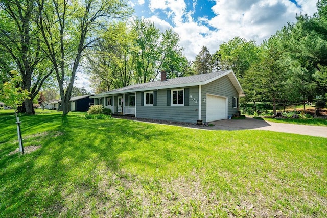 903 Ingalls Rd, Menomonie, WI 54751 - ranch-style home featuring a chimney, a front lawn, and driveway