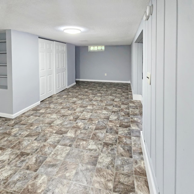 2718 Morgan Ave N, Minneapolis, MN 55411 - basement with a textured ceiling and baseboards