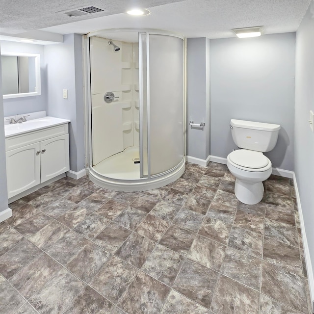 2718 Morgan Ave N, Minneapolis, MN 55411 - full bath with baseboards, vanity, a stall shower, a textured ceiling, and toilet