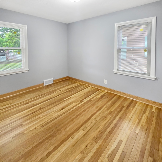 2718 Morgan Ave N, Minneapolis, MN 55411 - empty room with wood finished floors and baseboards