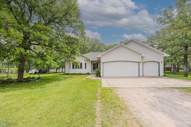 5916 Elm St N, Moorhead, MN 56560 - view of front facade featuring driveway, a garage, and a front lawn