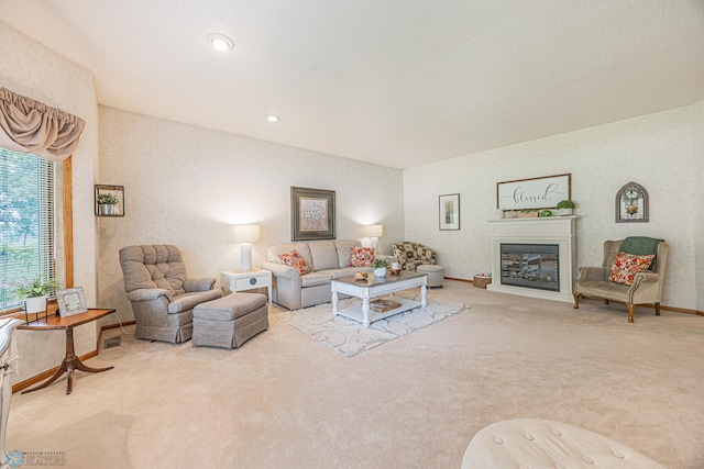 5916 Elm St N, Moorhead, MN 56560 - living area featuring carpet, a glass covered fireplace, baseboards, and recessed lighting