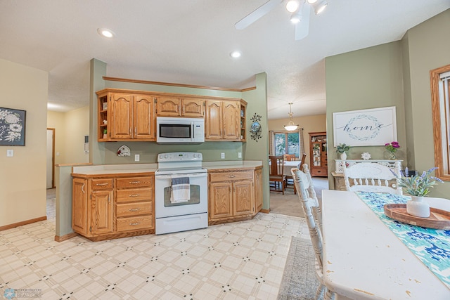 5916 Elm St N, Moorhead, MN 56560 - kitchen featuring white appliances, light countertops, a ceiling fan, open shelves, and light floors