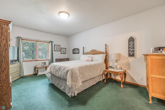 5916 Elm St N, Moorhead, MN 56560 - carpeted bedroom featuring a textured ceiling and baseboards