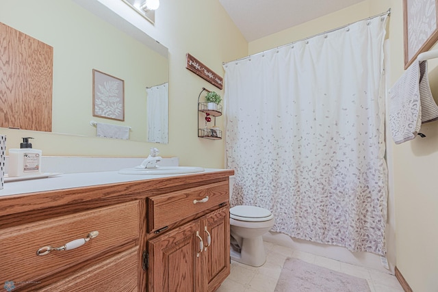 5916 Elm St N, Moorhead, MN 56560 - full bathroom featuring vanity, toilet, and a shower with shower curtain