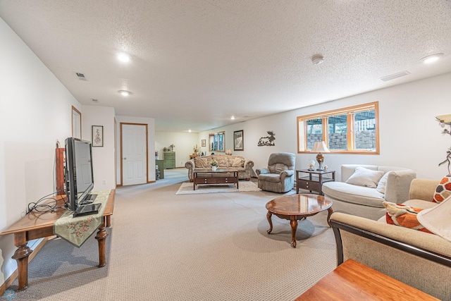 5916 Elm St N, Moorhead, MN 56560 - carpeted living area with a textured ceiling and recessed lighting