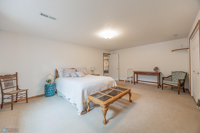 5916 Elm St N, Moorhead, MN 56560 - bedroom featuring light carpet, a textured ceiling, and baseboards