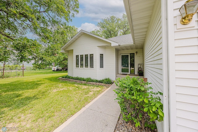 5916 Elm St N, Moorhead, MN 56560 - view of home's exterior with a yard and roof with shingles