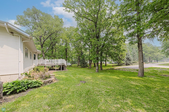 5916 Elm St N, Moorhead, MN 56560 - view of grassy yard featuring a wooden deck
