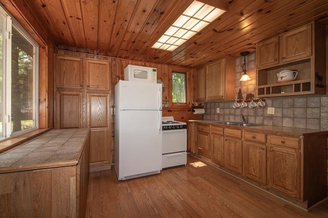 1378 Sunflower Trl NE, Outing, MN 56662 - kitchen featuring white appliances, a sink, plenty of natural light, and wooden ceiling