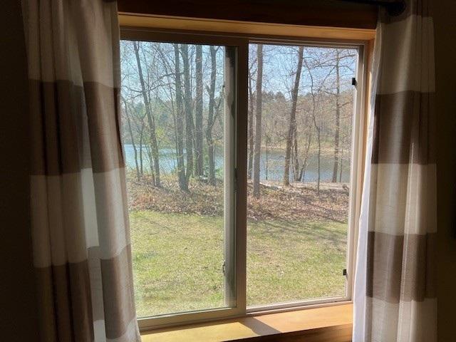 1378 Sunflower Trl NE, Outing, MN 56662 - doorway with a water view