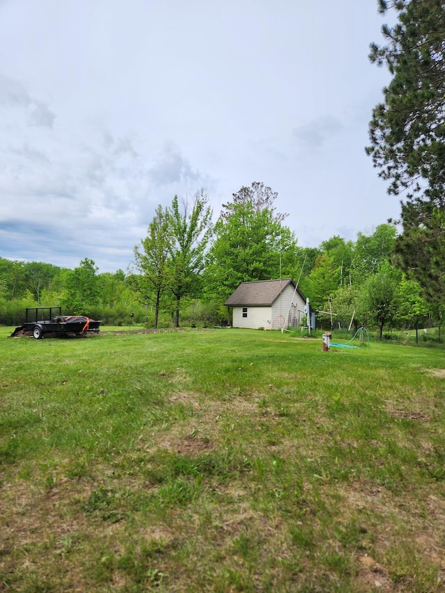 35270 Bear Creek Rd, Partridge Twp, MN 55704 - view of grassy yard featuring an outdoor structure