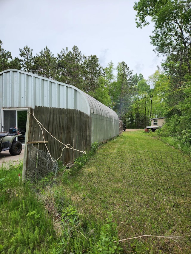 35270 Bear Creek Rd, Partridge Twp, MN 55704 - view of grassy yard with a pole building and an outdoor structure
