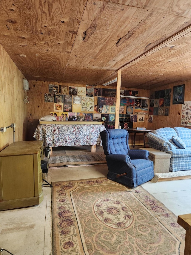 35270 Bear Creek Rd, Partridge Twp, MN 55704 - bedroom with wood ceiling, wooden walls, and unfinished concrete flooring