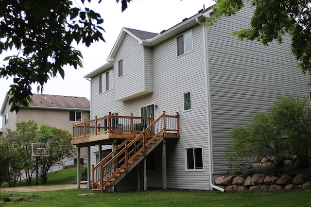 4860 Mason Ave NE, Saint Michael, MN 55376 - rear view of property with stairs, a deck, and a lawn