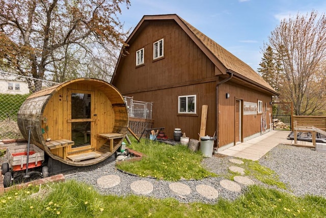 4031 Regent St, Duluth, MN 55804 - rear view of house featuring an outdoor structure and a shingled roof